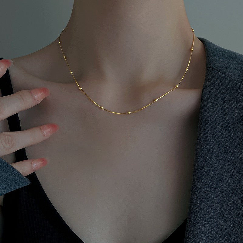 HUFE Simple and Versatile Round Bead Snake Bone Chain Titanium Steel Necklace for Women's Light Luxury and Luxury, with a Unique Design Plated with 18K Gold Lock Bone Chain
