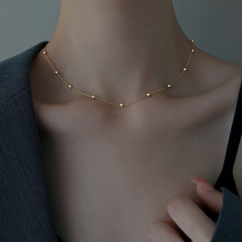 HUFE Simple and Versatile Round Bead Snake Bone Chain Titanium Steel Necklace for Women's Light Luxury and Luxury, with a Unique Design Plated with 18K Gold Lock Bone Chain