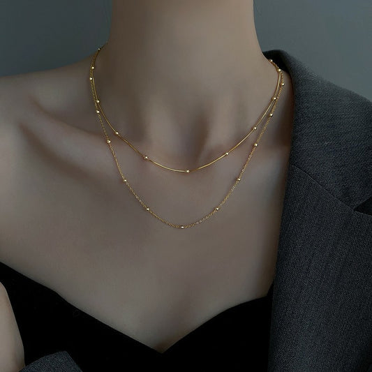 HUFE Simple and Versatile Round Bead Snake Bone Chain Titanium Steel Necklace for Women's Light Luxury and Luxury, with a Unique Design Plated with 18K Gold Lock Bone Chain